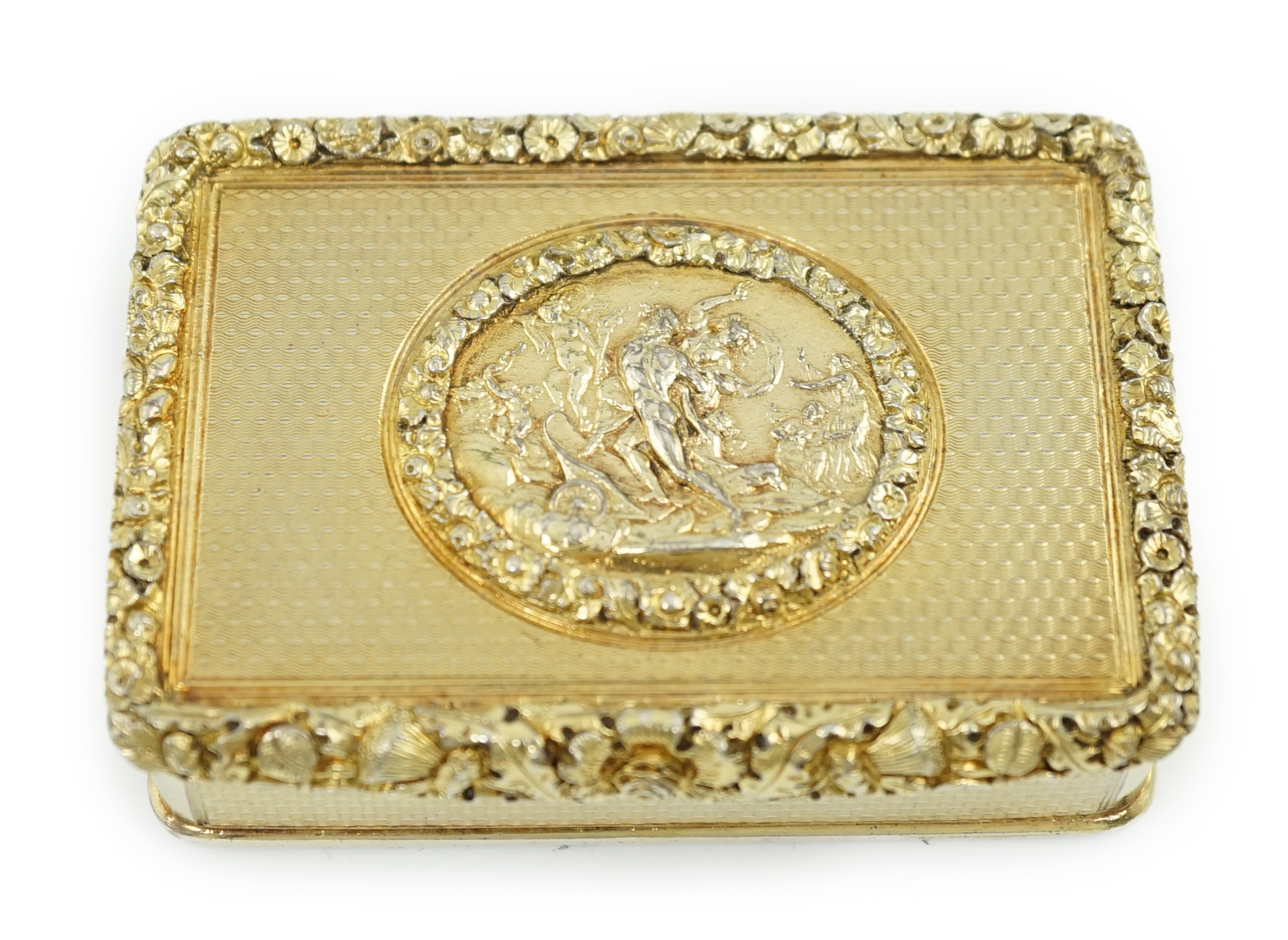 A late George III engine turned silver gilt rectangular snuff box, by William Snooke Hall